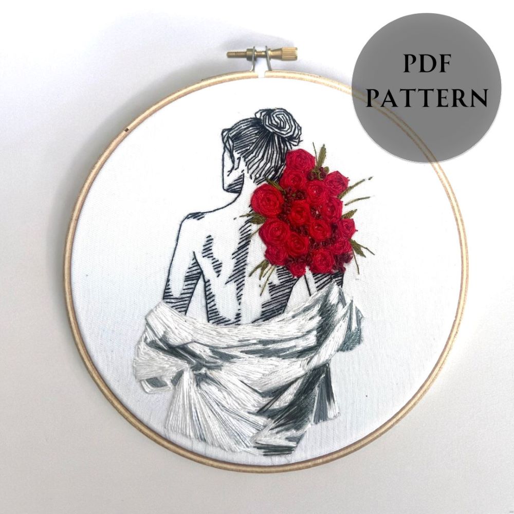 embroidery pattern for beginners with white shirt detail and red roses in rose stitch with green DMC thread detail