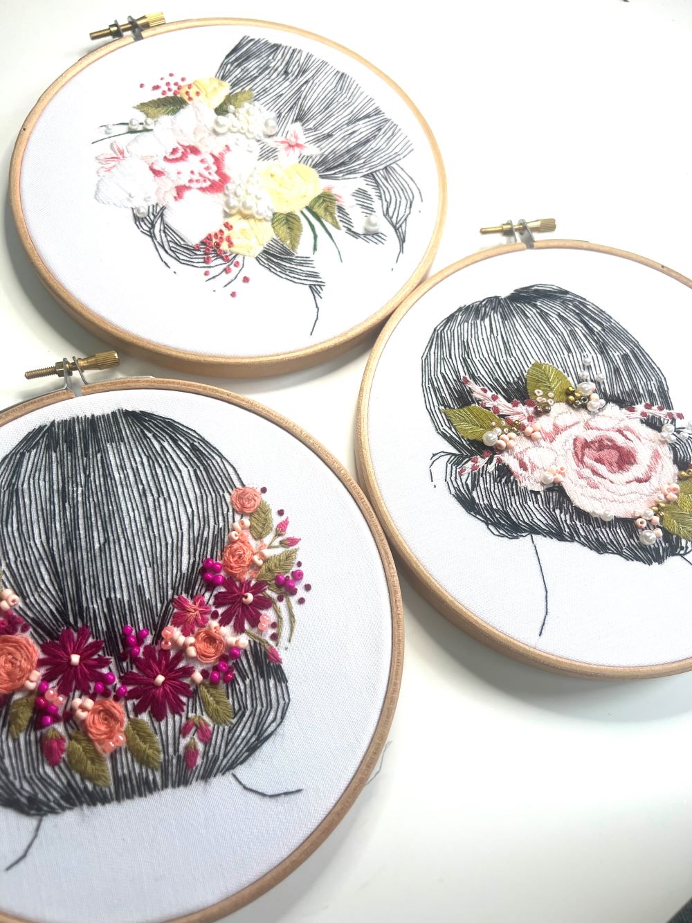 close up detail of embroidery pattern bundle suitable for beginners including 3 different PDFs with back stitch, straight stitich rose stitch and french knot 