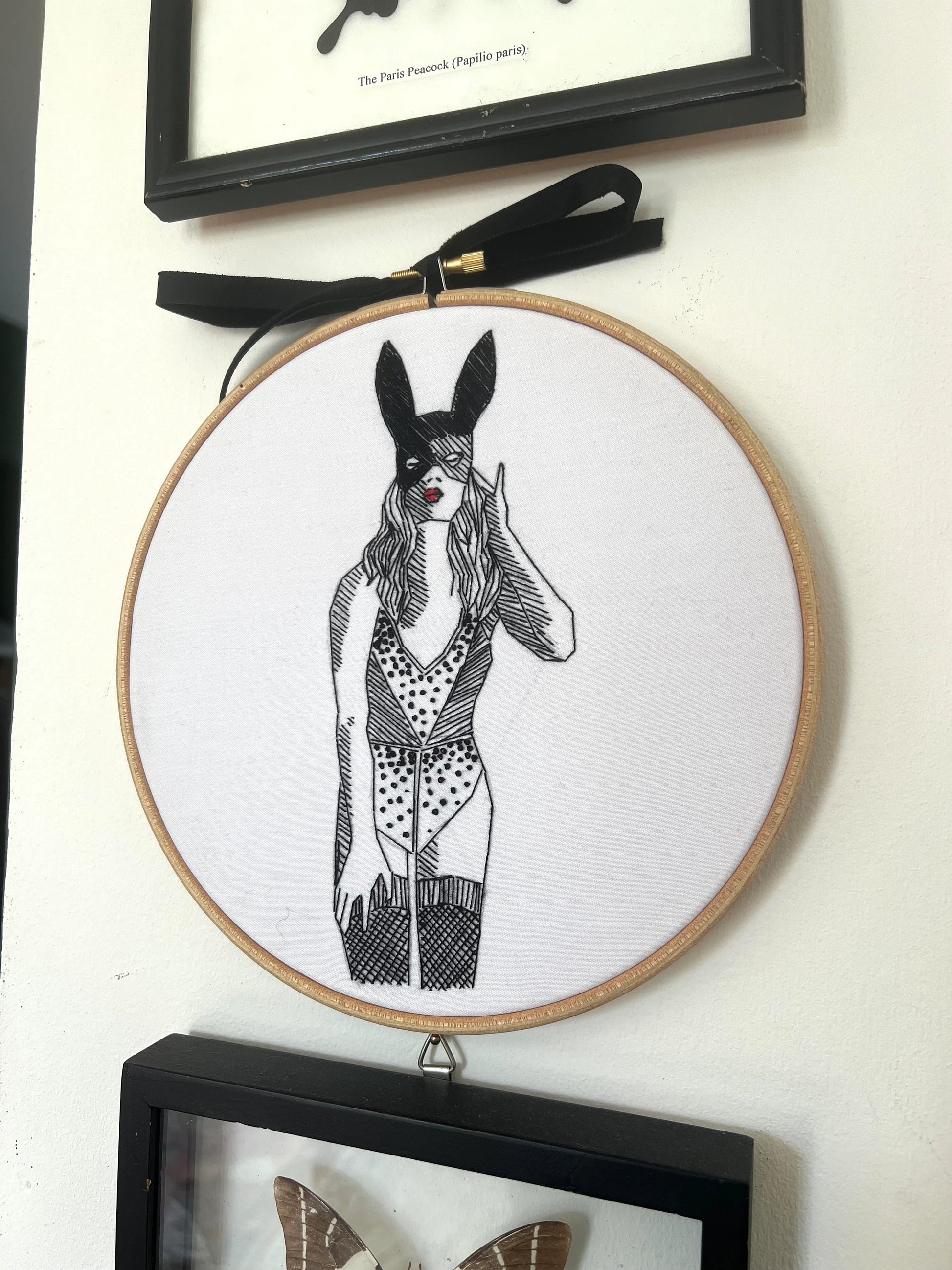 beginners completed embroidery kit using black and white cotton on wall interior