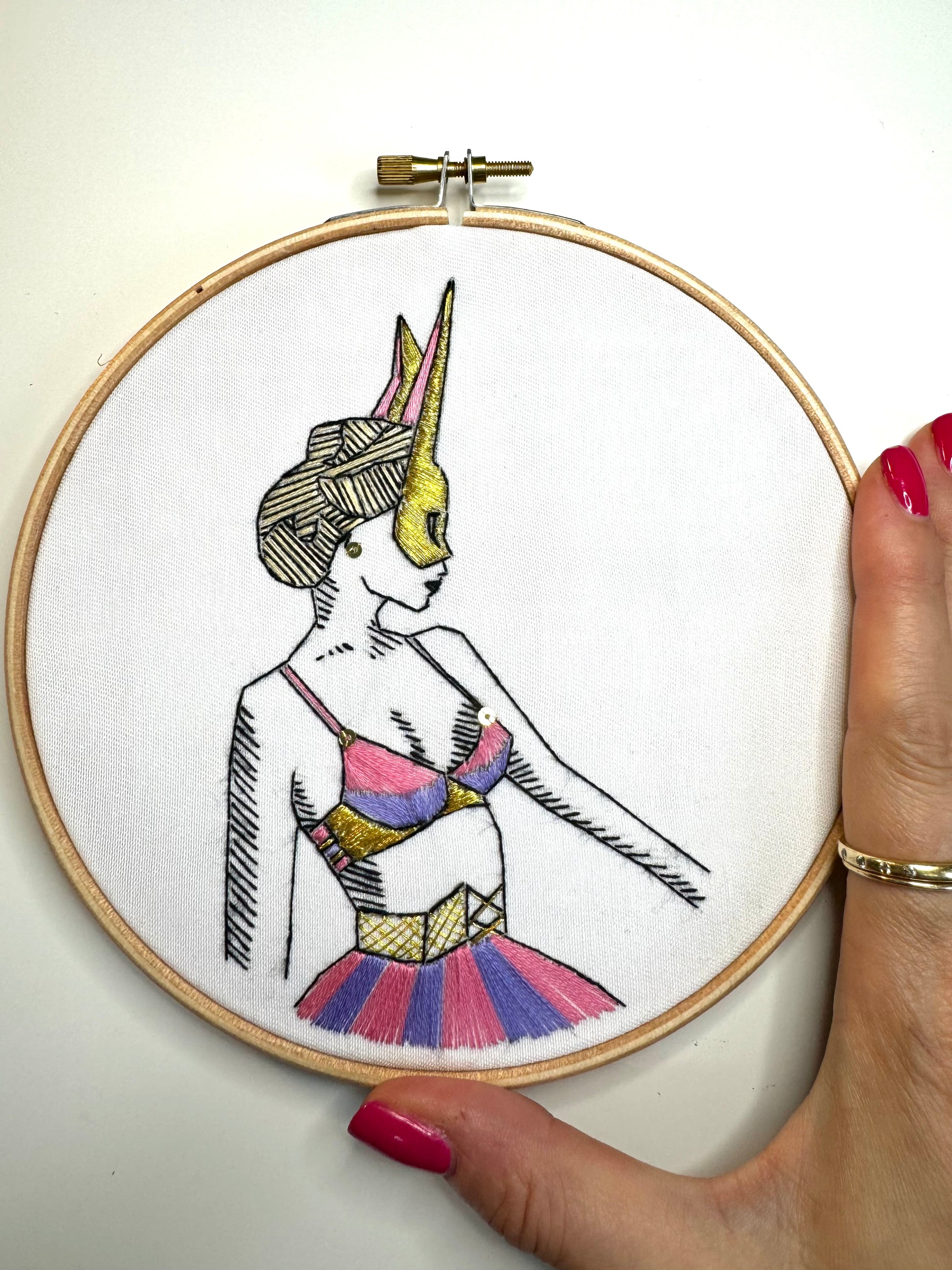 beginner friendly embroidery pattern with hand for scale