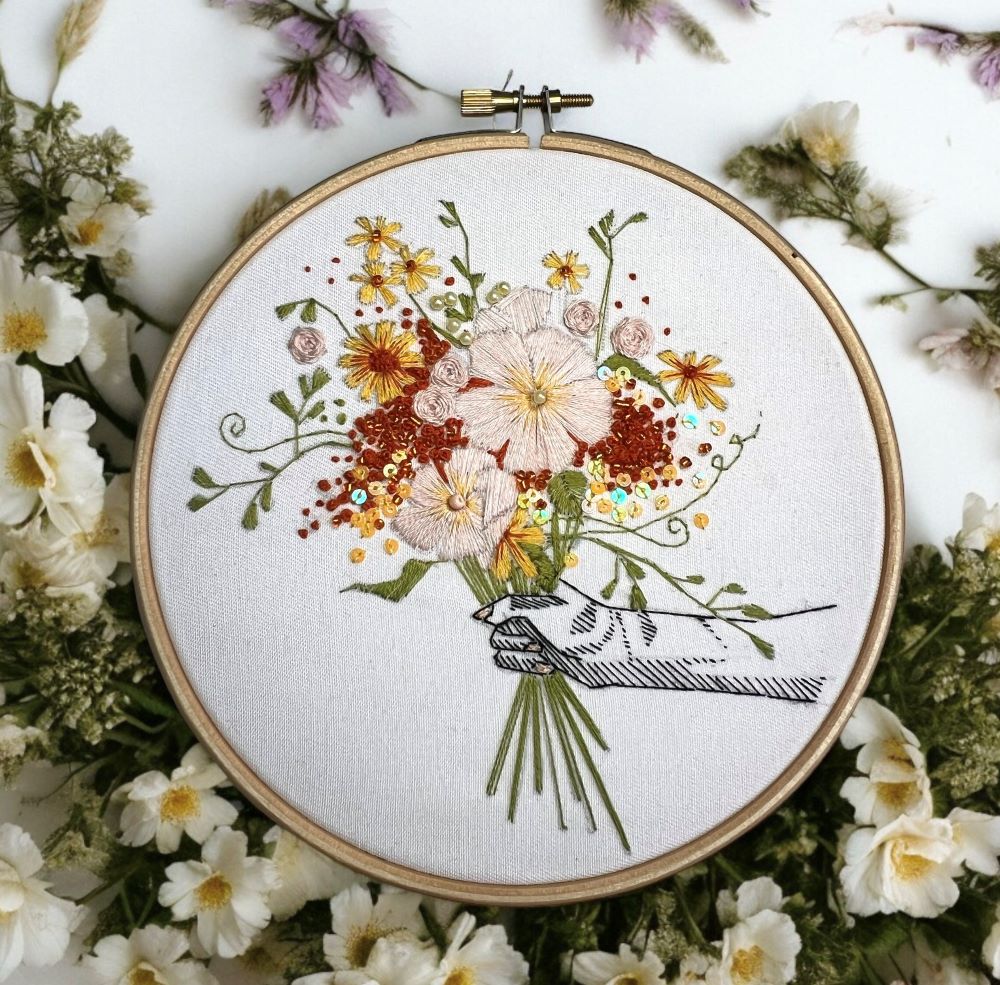 Floral bouquet embroidery with floral background in yellow and orange