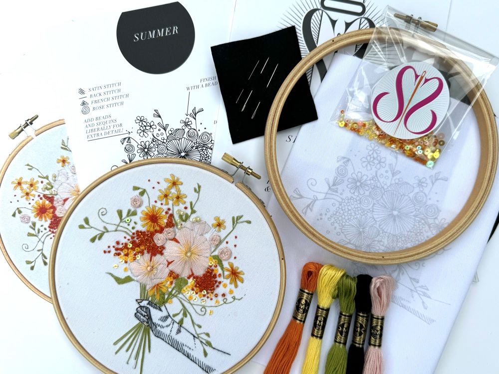 floral embroidery kit with full supplies including DMC threads wooden embroidery hoop, needles full instructions and printed design on cotton